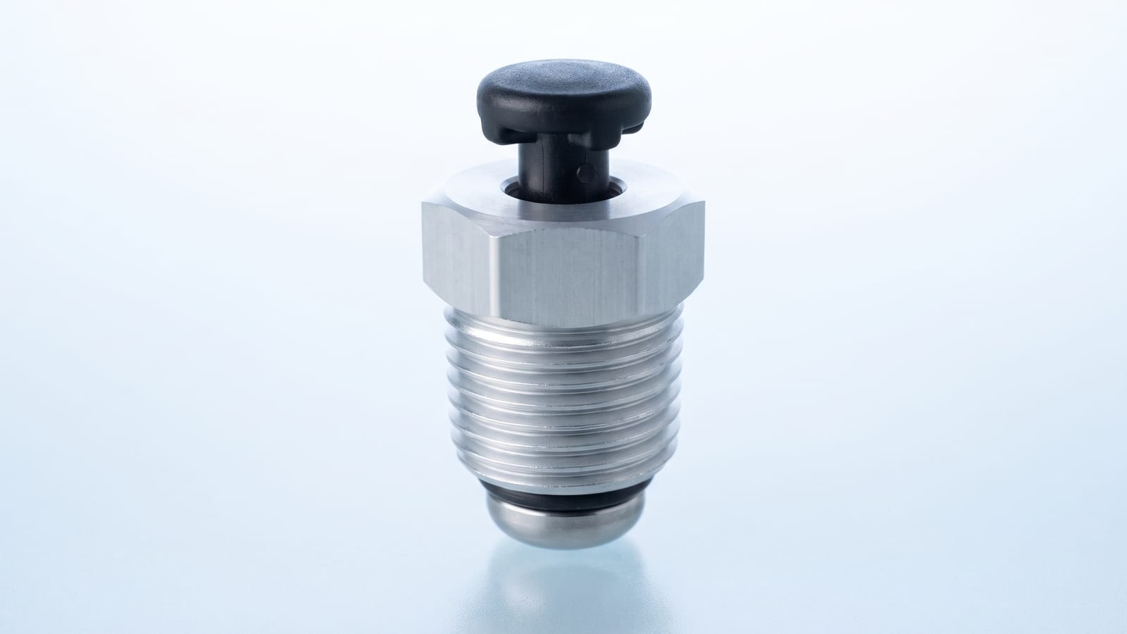Válvula de aire monobloque de aluminio anodizado sobre fondo claro de estudio